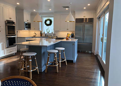 UltraCraft Cabinetry, White Kitchen with Accent Island in Network Gray, Larchmont, NY