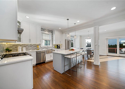 Scarsdale, NY - White Shaker Cabinetry by UltraCraft - Arctic White Perimeter with Network Gray Island